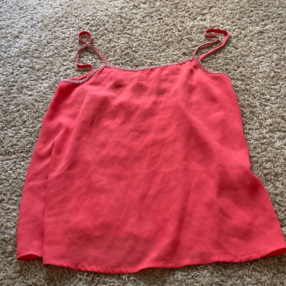 Pink tank top with a back cut out